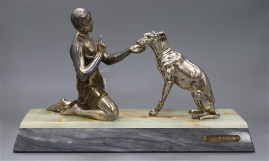 A Deco silvered metal figure of a lady with dog marked Ruffony